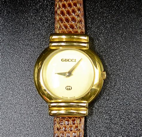 old gucci gold analog watch|old Gucci watches for women.